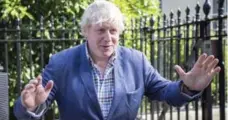  ?? RICK FINDLER/THE ASSOCIATED PRESS ?? Boris Johnson maintains he supports Prime Minister Theresa May.