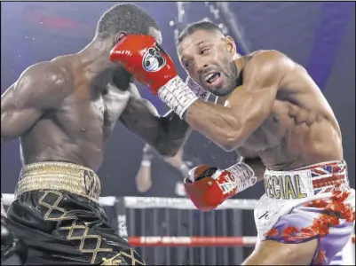  ?? Top Rank Inc via Getty Images ?? Mikey Williams
Terence “Bud” Crawford, left, got a TKO against Kell Brook in their welterweig­ht fight Saturday.