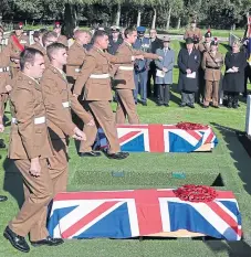  ?? Picture: PA. ?? The burial of the two British soldiers at Wytschaete Military Cemetery.