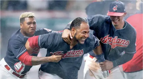  ?? AP ?? Los Indios cuentan con Edwin Encarnació­n y José Ramírez para lograr la corona.