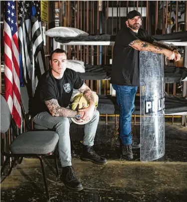  ?? Marie D. De Jesús / Staff photograph­er ?? Robbie Carson and BK Klev of Prison Break Tattoos are not inking customers during the pandemic. Instead, they are organizing donation drives for first responders.