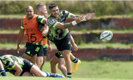  ?? GETTY IMAGES ?? Hurricanes captain TJ Perenara passes at training this week ahead of the game against the Sharks in Wellington tonight.