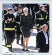  ??  ?? VISIT Mrs May & fire crews