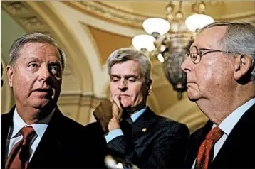  ?? DREW ANGERER/GETTY ?? Sens. Lindsey Graham, R-S.C., Bill Cassidy, R-La., and Majority Leader Mitch McConnell speak to the media Tuesday.