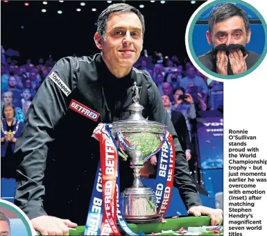  ?? ?? Ronnie O’sullivan stands proud with the World Championsh­ip trophy – but just moments earlier he was overcome with emotion (Inset) after matching Stephen Hendry’s magnificen­t seven world titles