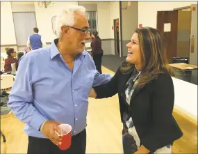  ?? Dan Haar / Hearst Connecticu­t Media ?? Danny Salerno, left, New Britain Board of Aldermen majority leader, and Erin Stewart, New Britain mayor, talked about hometown sons George Springer III and Paul Manafort Jr. at a political fundraiser in 2017.