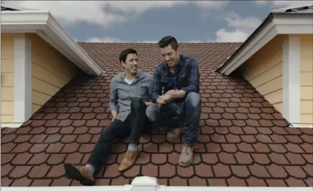  ?? PHOTOS BY TODD SPOTH, NYT ?? Celebrity designers and brothers, Drew and Jonathan Scott hang out on the roof of a local condo during a production day for their show, “Brother vs. Brother”.