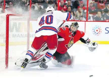 ?? JEAN LEVAC ?? Ottawa goaltender Craig Anderson made 34 stops, including this one on Michael Grabner, as the Senators slipped by the Rangers 2-1 in the series opener on Thursday night. The Senators are expecting the Rangers to push back hard in an effort to even the...