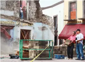  ?? FOTOS: MELISA AGÜERO ?? El Centro de Izúcar de Matamoros, con muchos destrozos.