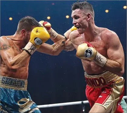  ??  ?? Hit parade: Callum Smith lands a right on Sweden’s Erik Skoglund on his way to reaching the semi-finals of the Super Series