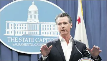  ?? Rich Pedroncell­i Associated Press ?? GOV. GAVIN NEWSOM says he asked for changes in the vaccine law “to help with the implementa­tion.”