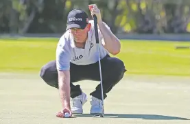  ?? MARCO GARCIA/ASSOCIATED PRESS ?? Brendan Steele lines up his putt on the ninth green Saturday at the Sony Open in Honolulu. Heading into the final round, he holds a two-shot lead.