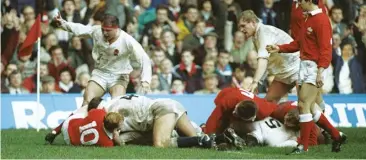  ??  ?? Slammed: Mike Teague scores the only try as England beat Wales in Cardiff in 1991