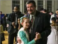  ?? EMILY OVERDORF — FOR DIGITAL FIRST MEDIA ?? Fathers and daughters danced the night away during last week’s Father Daughter Dance at Pottstown Middle School.