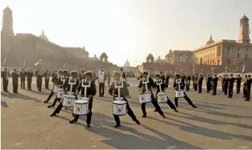  ?? — PRITAM BANDYOPADH­YAY ?? A Naval band rehearses for the Beating Retreat ceremony at Rajpath in New Delhi on Tuesday.