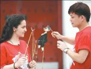  ??  ?? Internatio­nal students rehearse shadow-puppet play during a Chinese-language competitio­n held in 2014 in Changsha.