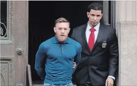  ?? JULIO CORTEZ THE ASSOCIATED PRESS ?? UFC star Conor McGregor, left, is facing criminal charges in the wake of a backstage melee.