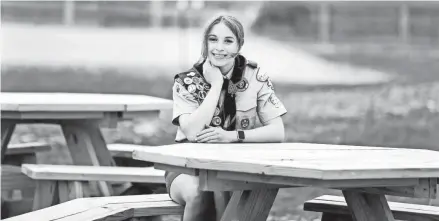  ?? EBONY COX, MILWAUKEE JOURNAL SENTINEL ?? It took Cassie Scheidt one month to build three picnic tables at the Racine County Pony Club as her Eagle Scout project.