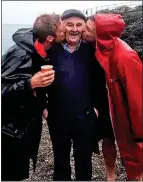  ??  ?? What a pair!: David and Stephen Flynn kiss am elderly gent pre-Covid