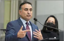  ?? RICH PEDRONCELL­I — THE ASSOCIATED PRESS ?? Assemblyma­n Ash Kalra, D-San Jose, discusses his bill that would pay for universal health care during a news conference at the Capitol in Sacramento on Jan. 6.