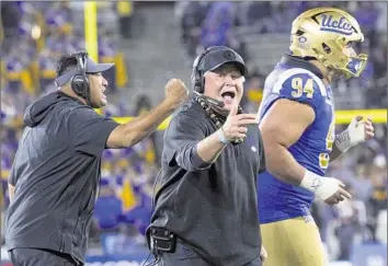  ?? Gina Ferazzi Los Angeles Times ?? UCLA COACH Chip Kelly yells at the officials after his team was called for a defensive penalty against Cal at the Rose Bowl. Kelly reiterated after the game on Saturday that he wasn’t concerned about his job status.