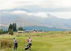  ??  ?? Millbrook Resort dwarfed by the Remarkable­s during the 2017 New Zealand Open in March.