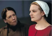  ?? GEORGE KRAYCHYK/HULU ?? Ann Dowd, left, and Elisabeth Moss in The Handmaid’s Tale, a likely Emmy contender again this year.