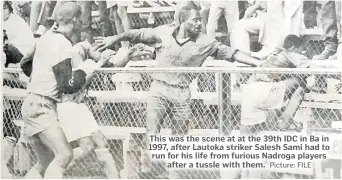  ?? Picture: FILE ?? This was the scene at at the 39th IDC in Ba in 1997, after Lautoka striker Salesh Sami had to run for his life from furious Nadroga players after a tussle with them.