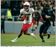  ?? (AP/Karl B DeBlaker) ?? Louisville wide receiver Jamari Thrash (1) runs with the ball Sept. 29 during a game against North Carolina State in Raleigh, N.C. Thrash, who has made 17 catches for 195 yards in his last two games, and the No. 18 Cardinals take on the No. 20 Duke Blue Devils on Saturday.