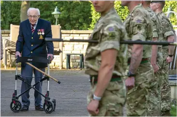  ??  ?? MILITARY HONOUR: Captain Tom was made an honorary colonel of the Yorkshire Regiment