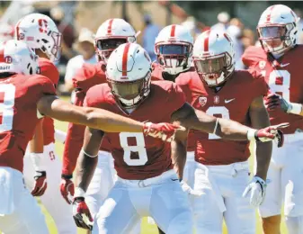  ?? Carlos Avila Gonzalez / The Chronicle ?? Stanford is pointing the way to Australia as the Cardinal will open the season against Rice in less than two weeks. The Cardinal just completed their second week of training camp.