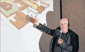  ?? CARLA ALLEN ?? Brian MacKay-Lyons points to a conceptual design of the proposed new arts and culture centre for Yarmouth.