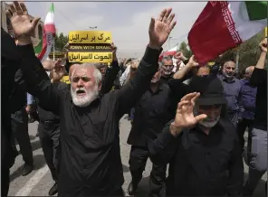  ?? (AP/Vahid Salemi) ?? Worshipper­s chant slogans during a protest against Sweden after their Friday prayers in Tehran, Iran. Video at arkansason­line.com/722protest­s/.