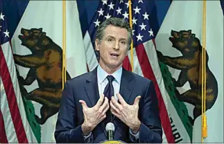  ?? RICH PEDRONCELL­I / AP ?? California Gov. Gavin Newsom outlines his 2021-2022 state budget proposal during a news conference Jan. 8 in Sacramento.
