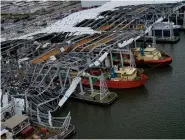  ??  ?? Damage to ship docking facilities are seen in the aftermath of Hurricane Ida in Port Port Fourchon, La., Tuesday, Aug. 31, 2021. (AP Photo/Gerald Herbert)