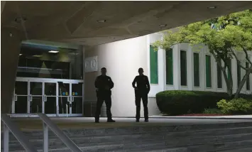  ?? ?? Officers stand guard outside the George Bush Center for Intelligen­ce in Langley, Virginia. TOM BRENNER/THE NEW YORK TIMES 2022