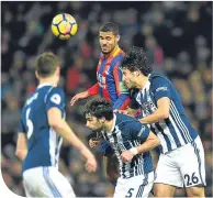  ??  ?? Ruben Loftus-Cheek of Crystal Palace clears under West Brom pressure