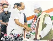  ?? ?? NCP president Sharad Pawar with former Congress leader Siraj Mehndi as the latter joins NCP, in Mumbai on Tuesday.