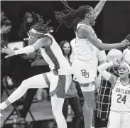  ?? Orlin Wagner / Associated Press ?? Baylor’s NaLyssa Smith, left, and Queen Egbo combined for 31 points and 32 rebounds.