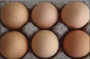  ?? PHOTO ILLUSTRATI­ON: JUSTIN SULLIVAN/GETTY IMAGES ?? Fresh brown eggs sit in a carton in San Rafael, Calif.