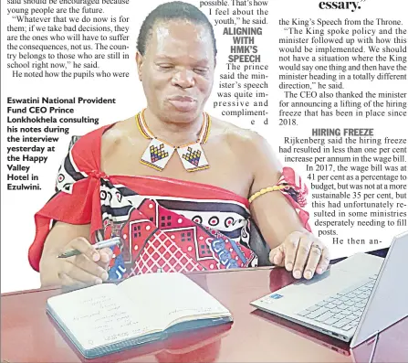  ?? ?? Eswatini National Provident Fund CEO Prince Lonkhokhel­a consulting his notes during the interview yesterday at the Happy
Valley
Hotel in
Ezulwini.