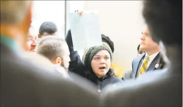  ?? Hearst Connecticu­t Media file photo ?? Workers rally at the Hilton Stamford Hotel & Executive Meeting Center in December 2017 in Stamford as part of a drive to unionize their workplace.