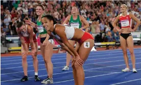  ?? ?? Katarina Johnson-Thompson likes what she sees on the leaderboar­d after the heptathlon 800m, while Northern Ireland’s Kate O’Connor (second left) and Jade O’Dowda (left) took silver and bronze. Photograph: Tom Jenkins/The Guardian