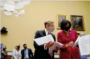  ?? AMR ALFIKY / THE NEW YORK TIMES ?? Dr. David Kessler, chief science officer of the White House COVID-19 team, and Dr. Rochelle Walensky, CDC director, peruse documents before testifying at a House Select Committee in April 2021.