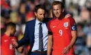  ??  ?? Gareth Southgate with Harry Kane after the striker’s late goal gave England a 2-2 draw against Scotland at Hampden Park in a June 2017 World Cup qualifier. Photograph: Shaun Botterill/Getty Images
