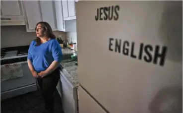  ?? MIGUEL MARTINEZ/THE ATLANTA JOURNAL-CONSTITUTI­ON/TNS FILE PHOTO ?? Carola Briceño Peña, a refugee from Venezuela, stands in the kitchen of her Clarkston, Ga., apartment.