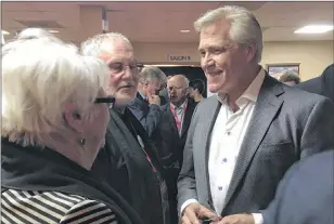  ?? ASHLEY FITZPATRIC­K/THE TELEGRAM ?? Premier Dwight Ball chats with people who attended the Liberal convention in Gander over the weekend.