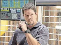  ?? DAVID LEE / SUMMIT ?? Mark Wahlberg plays an unlikely hero in “Deepwater Horizon,” based on the true story of the 2010 Deepwater Horizon explosion and oil spill in the Gulf of Mexico.
