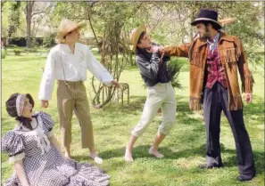  ?? CAROL ROLF/CONTRIBUTI­NG PHOTOGRAPH­ER ?? Injun Joe, right, played by Zac Hickman, threatens Tom Sawyer, played by Luke Ferguson. Also shown are Becky Thatcher, far left, played by Annslee Clay, and Huckleberr­y “Huck” Finn, played by Will Porter. These characters and others will be featured in...