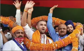  ?? ANI ?? LJP chief Chirag Paswan being garlanded by supporters during an election campaign on upcoming Bihar assembly polls in Sasaram on Saturday.